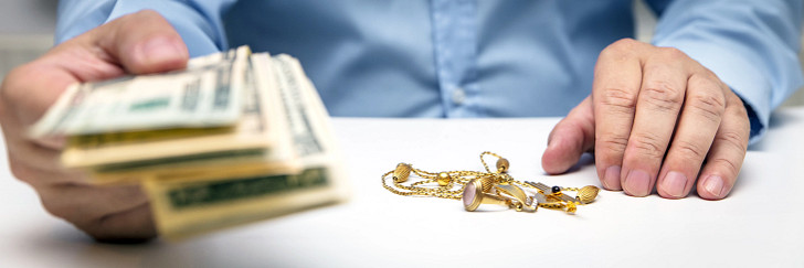 Man paying for jewelry
