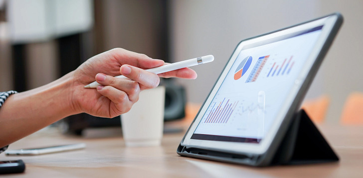 Business owner reviewing performance