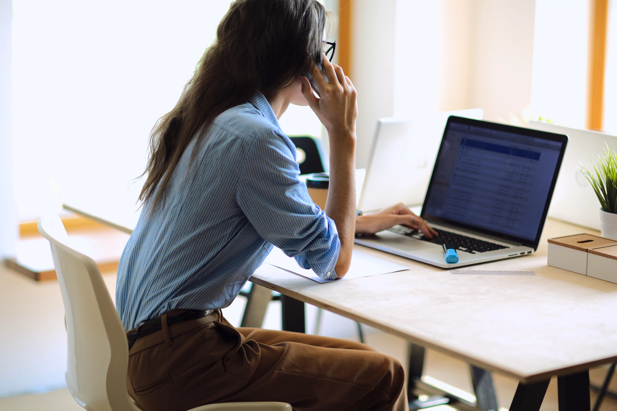 Woman working at her home office