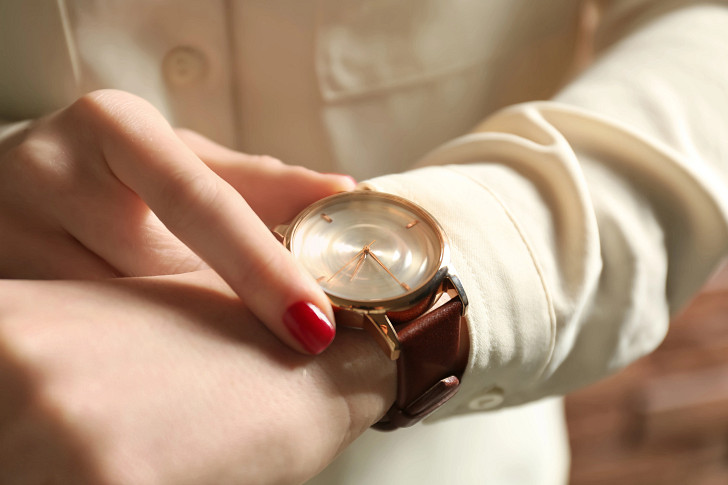 Woman with Gold watch